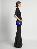 Image of model wearing Raffia PS1 Mini Crossbody Bag in COBALT