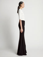 Side image of model wearing Viscose Suiting Pants in black
