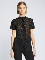 Cropped front image of model wearing Stretch Lace Top in black