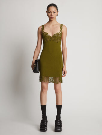 Front image of model wearing Embroidered Viscose Knit Dress in olive