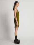 Side image of model wearing Embroidered Viscose Knit Dress in olive