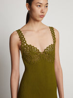 Detail image of model wearing Embroidered Viscose Knit Dress in olive