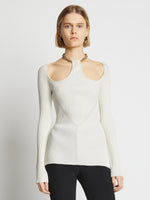 Cropped front image of model wearing Chain Detail Viscose Knit Sweater in off white