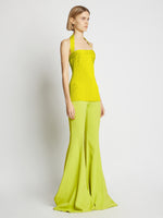 Side image of model wearing Viscose Knit Halter Top in sulphur