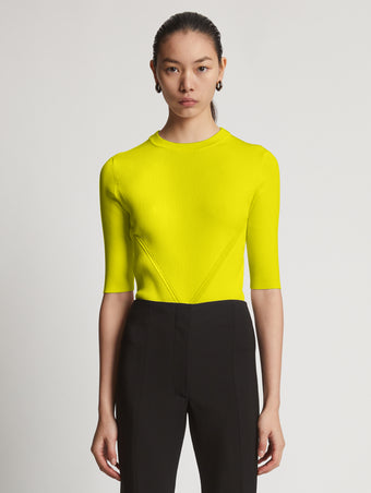 Cropped front image of model wearing  Viscose Knit Top in sulphur