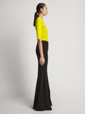 Side image of model wearing Viscose Knit Top in sulphur