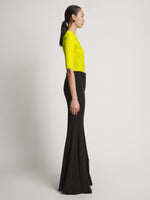 Side image of model wearing Viscose Knit Top in sulphur