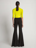 Back image of model wearing Viscose Knit Top in sulphur