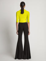 Back image of model wearing Viscose Knit Top in sulphur
