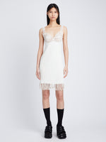 Front image of model wearing Embroidered Viscose Knit Dress in off white