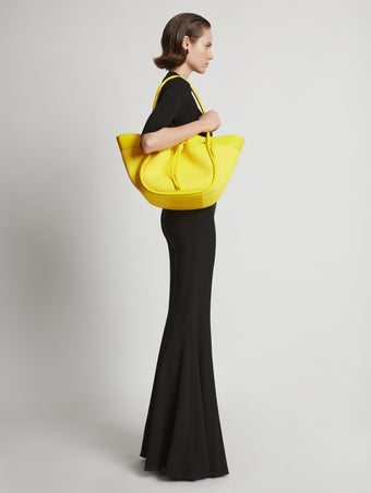 Image of model wearing Raffia Large Ruched Tote in CANARY YELLOW