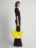 Image of model wearing Raffia Large Ruched Tote in CANARY YELLOW