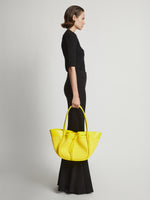 Image of model wearing Raffia Large Ruched Tote in CANARY YELLOW