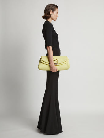 Image of model carrying Bar Bag in LEMONGRASS