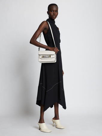 Image of model wearing PS11 Mini Classic Bag in CLAY.jpg