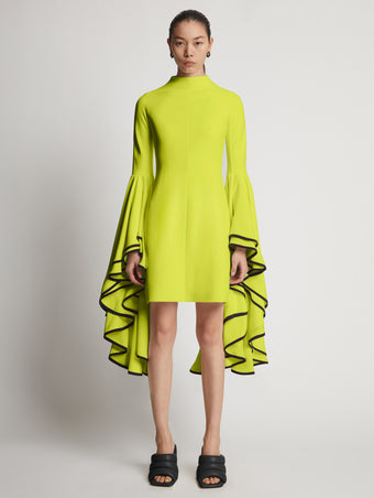 Front image of model wearing Viscose Crepe Dress in bright green