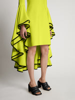 Detail image of model wearing Viscose Crepe Dress in bright green