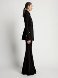 Side image of model wearing Viscose Suiting Jacket in black