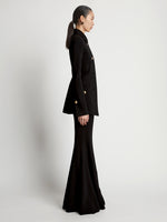 Side image of model wearing Viscose Suiting Jacket in black