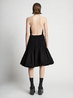 Back image of model wearing Stretch Nylon Dress in black