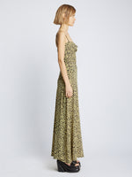 Side image of model wearing Printed Leopard Tank Dress in butter multi