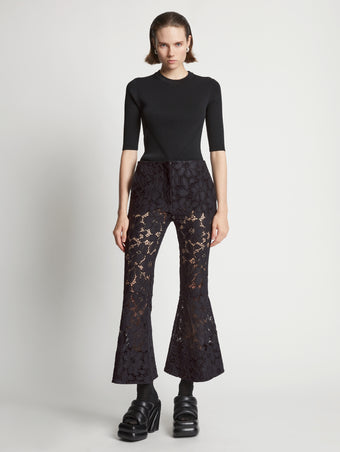 Front image of model wearing Lace Pants in black