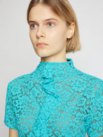 Detail image of model wearing Stretch Lace Top in cyan
