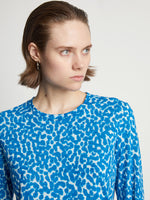 Detail image of model wearing Printed Leopard T-Shirt in blue multi