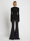 Back image of model wearing Chain Detail Viscose Knit Sweater in black