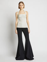 Front image of model wearing Viscose Knit Halter Top in off white
