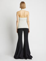 Back image of model wearing Viscose Knit Halter Top in off white