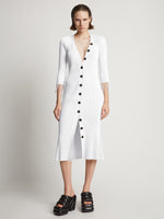 Front image of model wearing Viscose Knit Dress in optic white