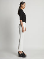 Side image of model wearing Viscose Suiting Straight Pants in off white