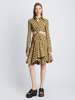 Front image of model wearing Printed Dot Cut Out Shirt Dress in khaki black