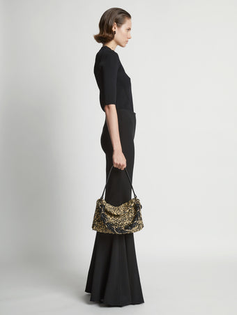 Image of model wearing Crochet Braid Bag in BLACK/NATURAL