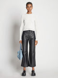 Front image of model wearing Cropped Turtleneck Chenille Sweater in off white