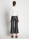 Back image of model wearing Cropped Turtleneck Chenille Sweater in off white
