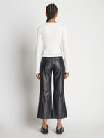 Back image of model wearing Cropped Turtleneck Chenille Sweater in off white