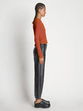 Side image of model wearing Cropped Turtleneck Chenille Sweater in rose