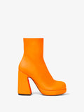 Front image of Forma Platform Boots in Orange