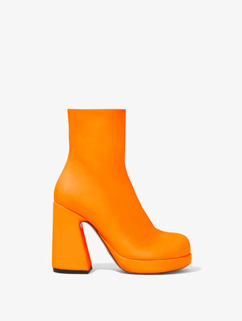 Front image of Forma Platform Boots in Orange