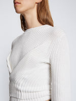 Detail image of model wearing Ribbed Cotton Wrap Sweater in OFF WHITE