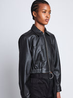 Detail image of model wearing Cropped Leather Jacket in BLACK