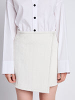 Detail image of model wearing Tweed Wrap Skirt in OFF WHITE