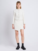 Front full length image of model wearing Tweed Wrap Skirt in OFF WHITE with matching Tweed Jacket in OFF WHITE