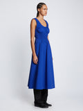 Side full length image of model wearing Poplin Gathered Dress in ROYAL BLUE