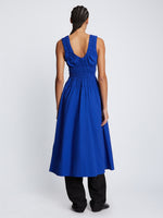 Back full length image of model wearing Poplin Gathered Dress in ROYAL BLUE