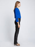 Side full length image of model wearing Tweed Cropped Jacket in ROYAL BLUE