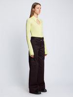 Side full length image of model wearing Cotton Twill Cargo Pants in BLACK