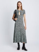 Front full length image of model wearing Slinky Jersey Keyhole Dress in BLACK/WHITE/JADE